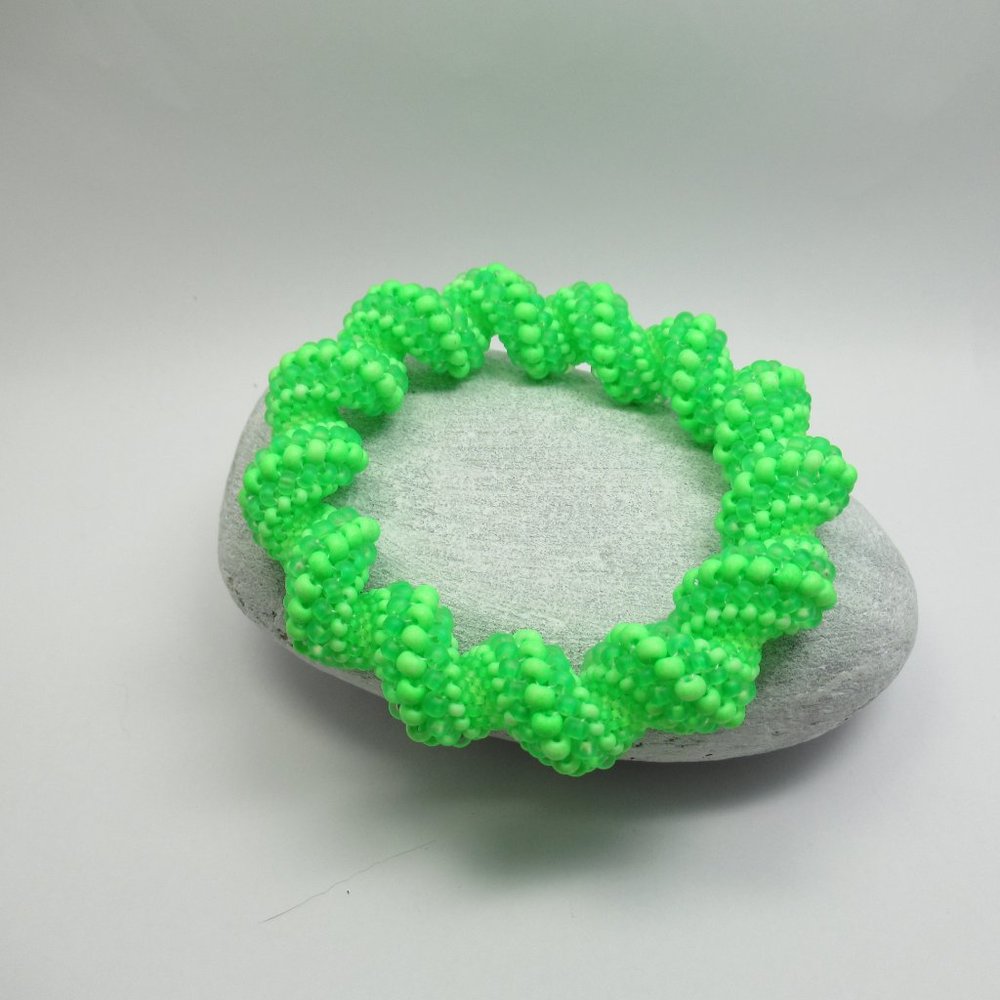 UV reactive Cellini spiral handwoven bangle bracelet